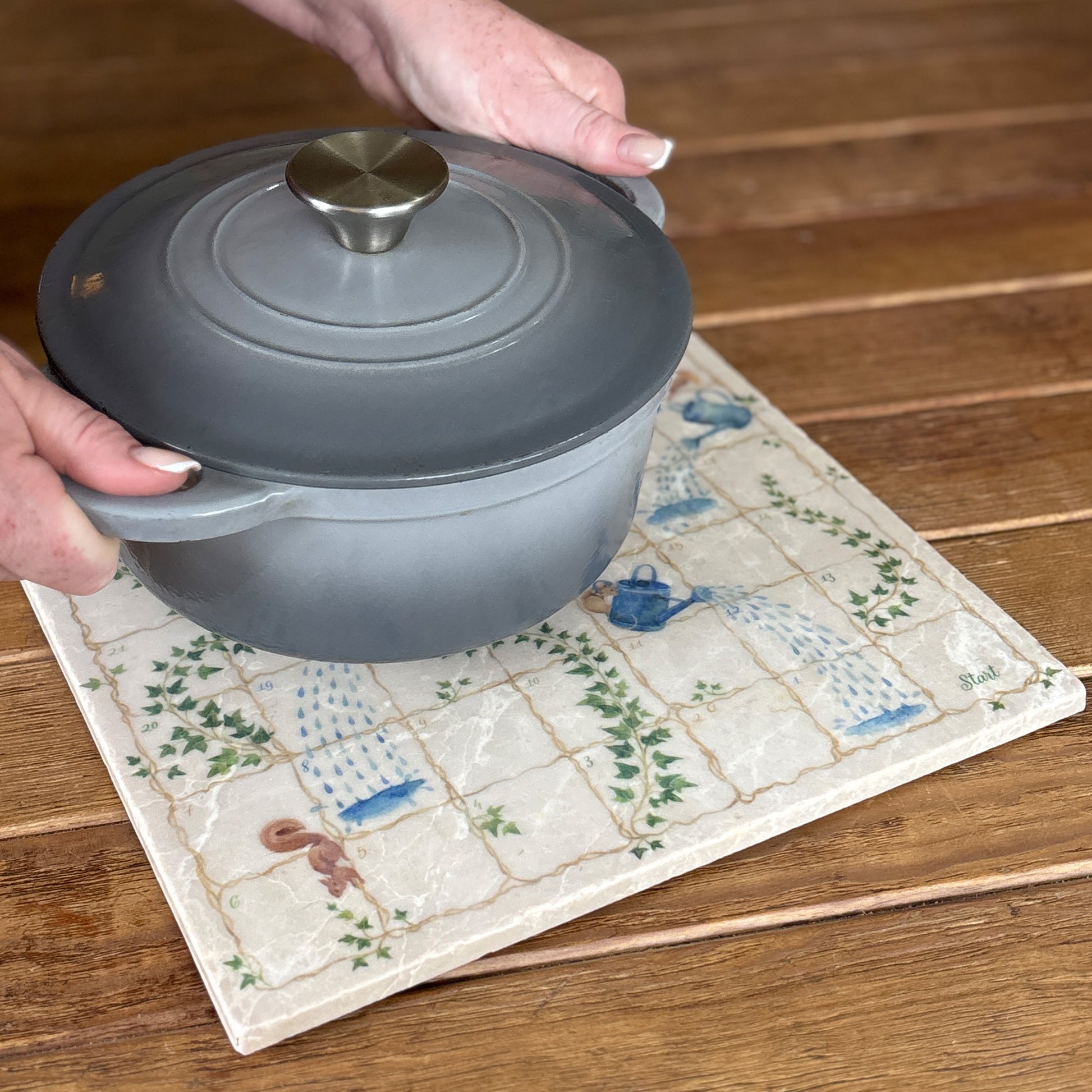 Luxury Snakes and Ladders board game handcrafted from natural marble stone, showcasing intricate detailing and timeless craftsmanship. After play your games board turns into a handy worktop/table protector. 