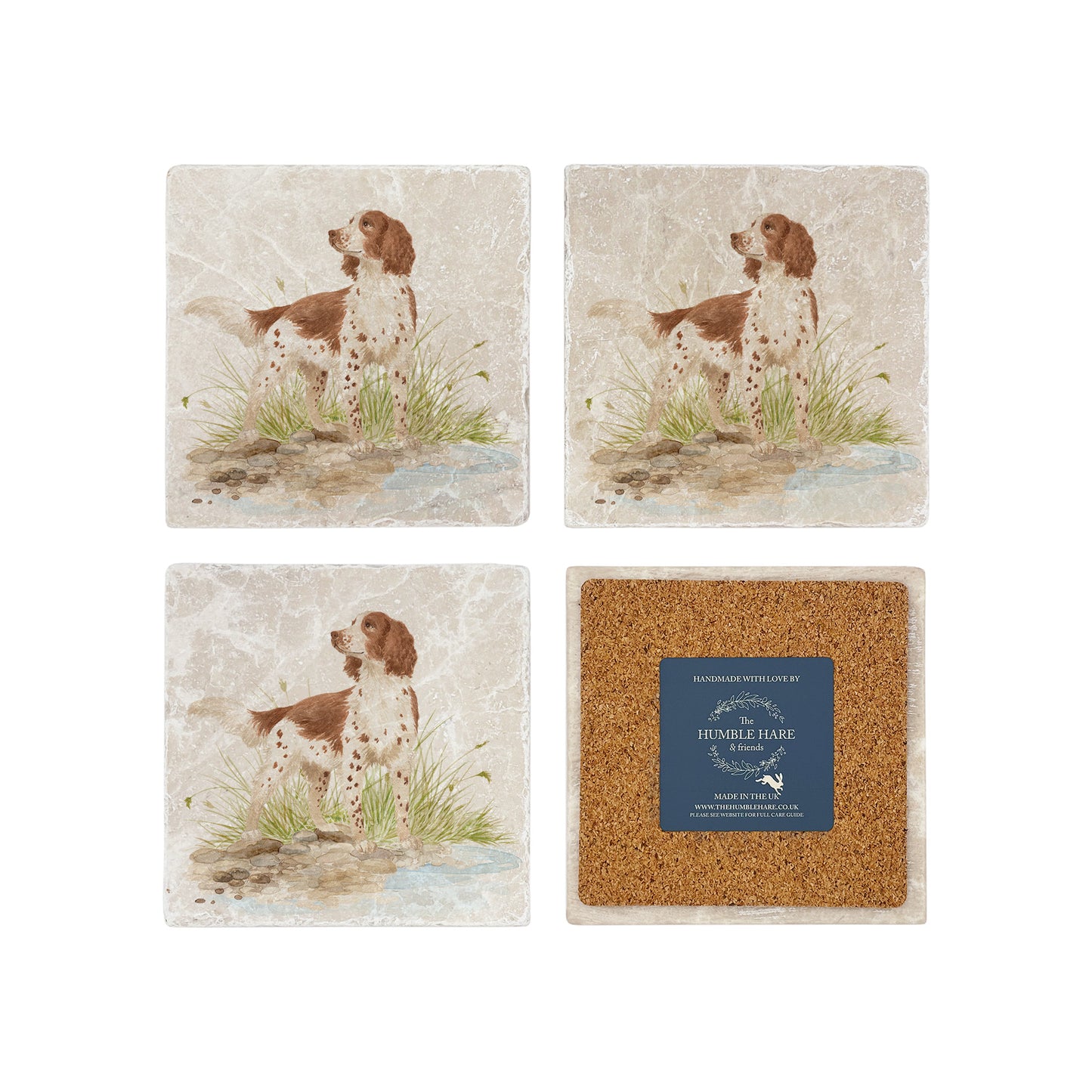 A set of 4 square marble coasters with a watercolour design of a working spaniel dog by a riverbank. One coaster is flipped to show that it is backed with cork to protect work surfaces.