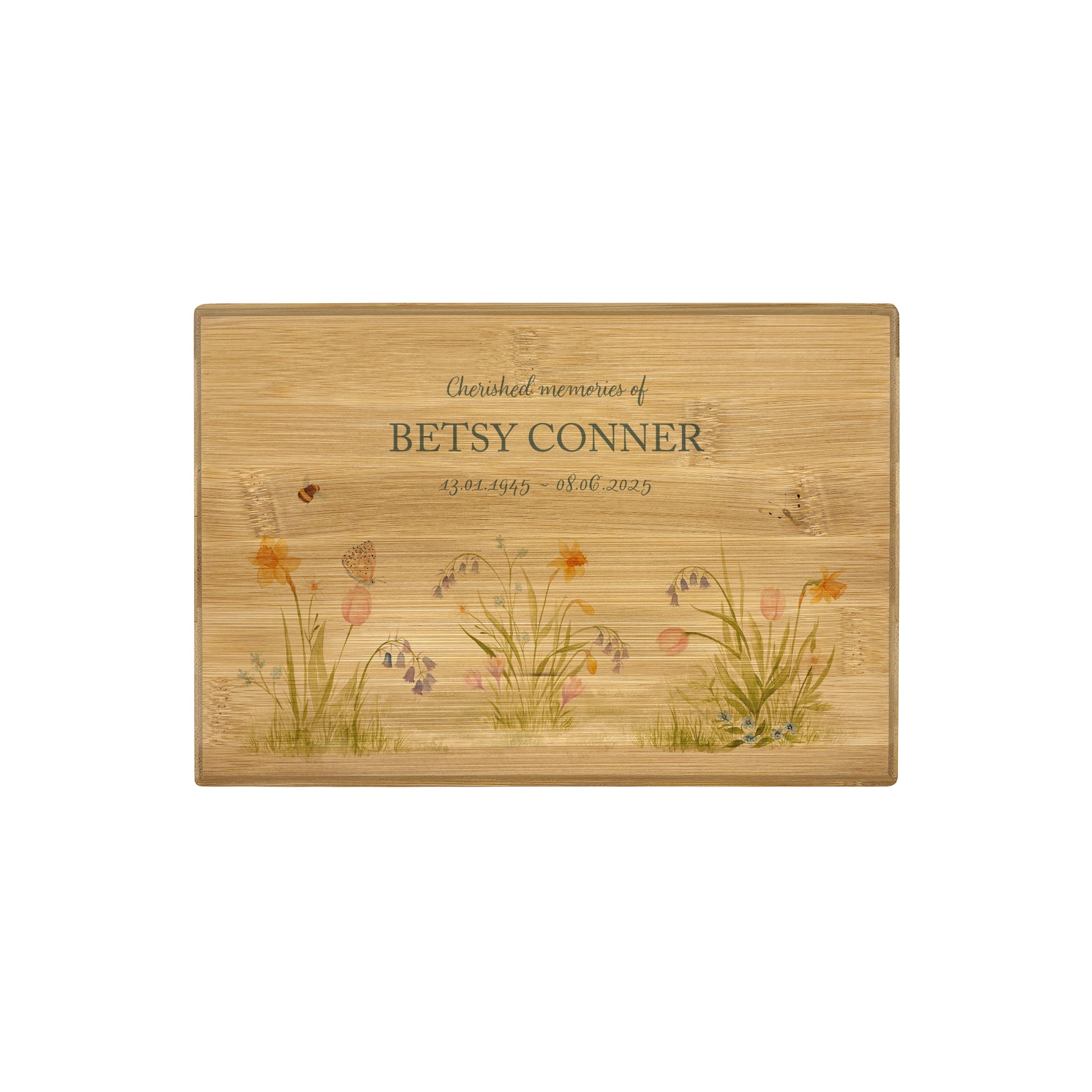 A beautifully crafted solid Bamboo wooden urn, personalised and finished with a soft watercolour design of Spring Flowers for the person who loved flowers and being in the Garden. Thoughtfully made for either display or burial, this personalised urn can be customised to create a meaningful memorial. Perfect for holding ashes of a loved one or a beloved pet, it serves as a comforting tribute and keepsake. 