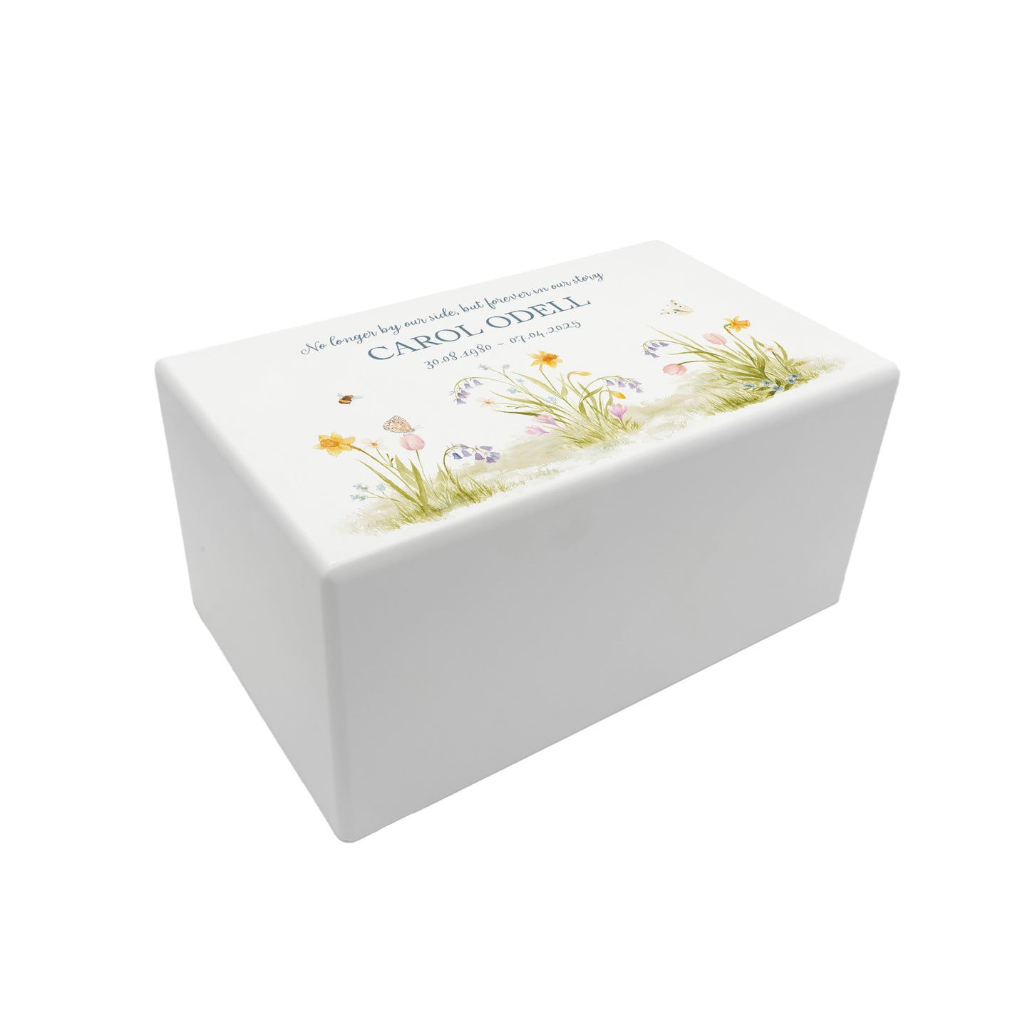 A beautifully crafted solid wooden urn, finished in white with a soft watercolour design of a Spring Garden with Bees and Butterflies, Thoughtfully made for either display or burial, this personalised urn can be customised to create a meaningful memorial. Perfect for holding ashes of a loved one or a beloved pet, it serves as a comforting tribute and keepsake.