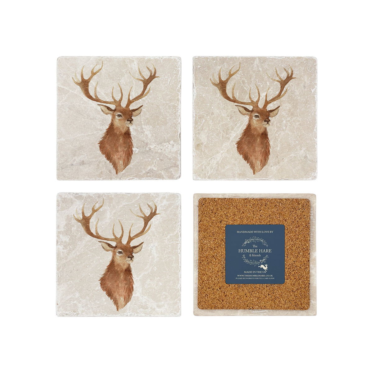 A set of four marble coasters with a watercolour illustration of a stag's head. One coaster is flipped to show the back is covered with cork.