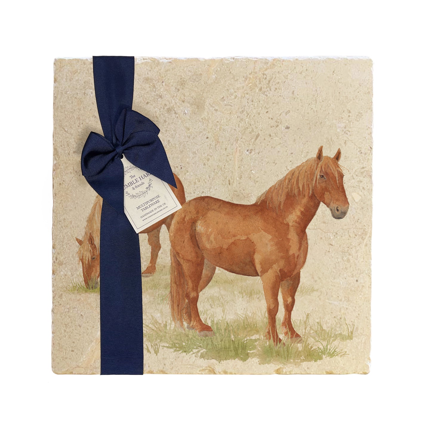 A multipurpose marble platter with a watercolour Suffolk Punch horse design, packaged with a luxurious dark blue bow and branded gift tag.