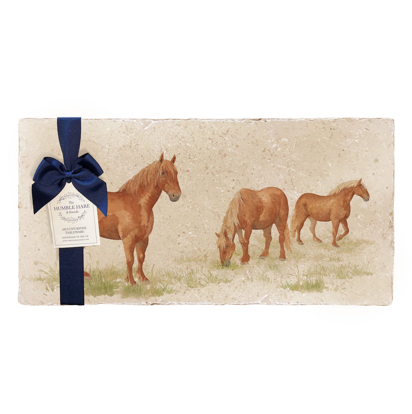 A multipurpose marble sharing platter with a watercolour Suffolk Punch horse, packaged with a luxurious dark blue bow and branded gift tag.