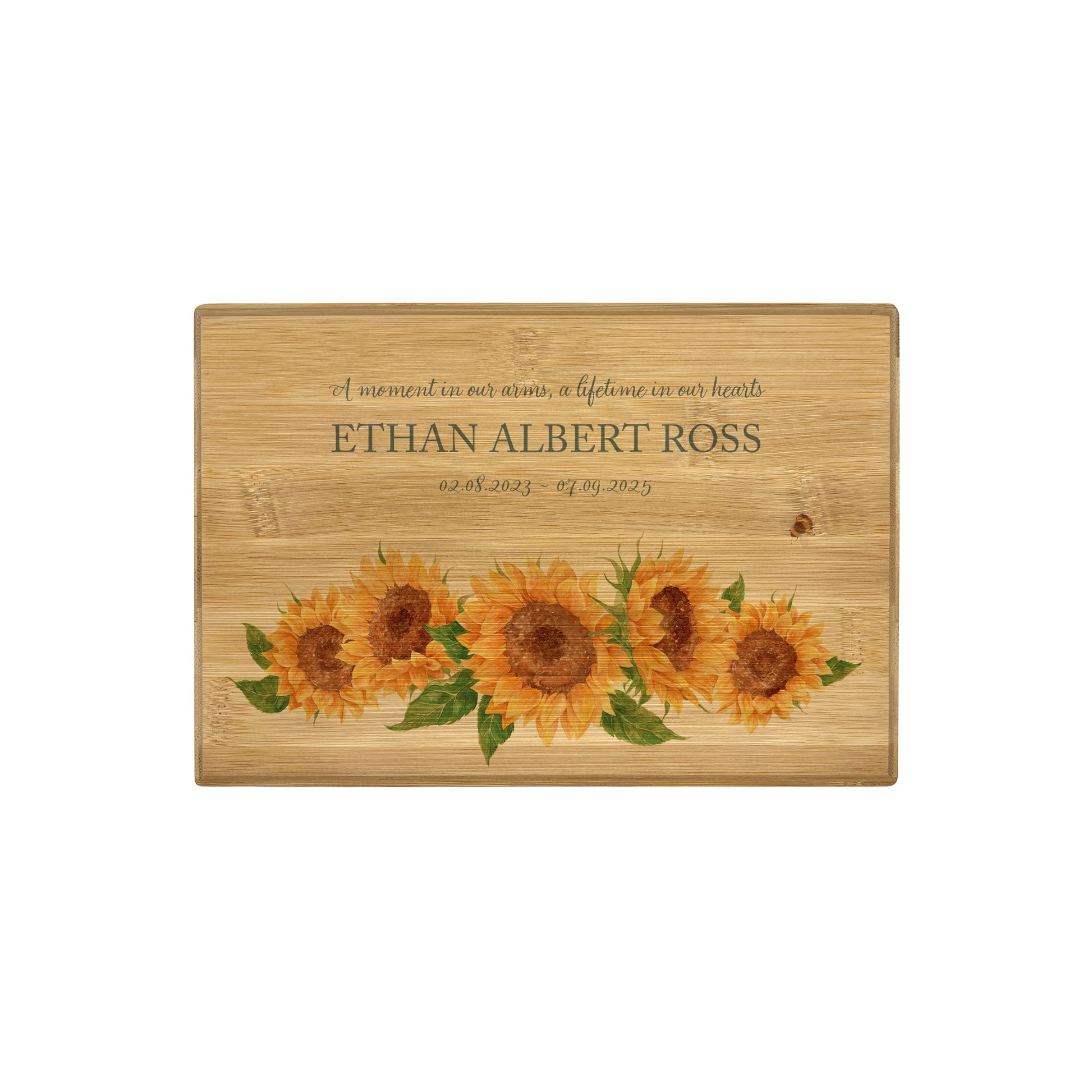 A beautifully crafted solid Bamboo wooden urn, personalised and finished with a soft watercolour design of Sunflowers and buzzy bees.  Thoughtfully made for either display or burial, this personalised urn can be customised to create a meaningful memorial. Perfect for holding ashes of a loved one or a beloved pet, it serves as a comforting tribute and keepsake. 