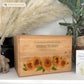 A beautifully crafted solid Bamboo wooden urn, personalised and finished with a soft watercolour design of Sunflowers and buzzy bees.  Thoughtfully made for either display or burial, this personalised urn can be customised to create a meaningful memorial. Perfect for holding ashes of a loved one or a beloved pet, it serves as a comforting tribute and keepsake. 