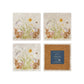 A set of four marble coasters with a watercolour design of spring flowers and cute fluffy bunnies. One coaster in the set is flipped to show that they have a cork back to protect worksurfaces.
