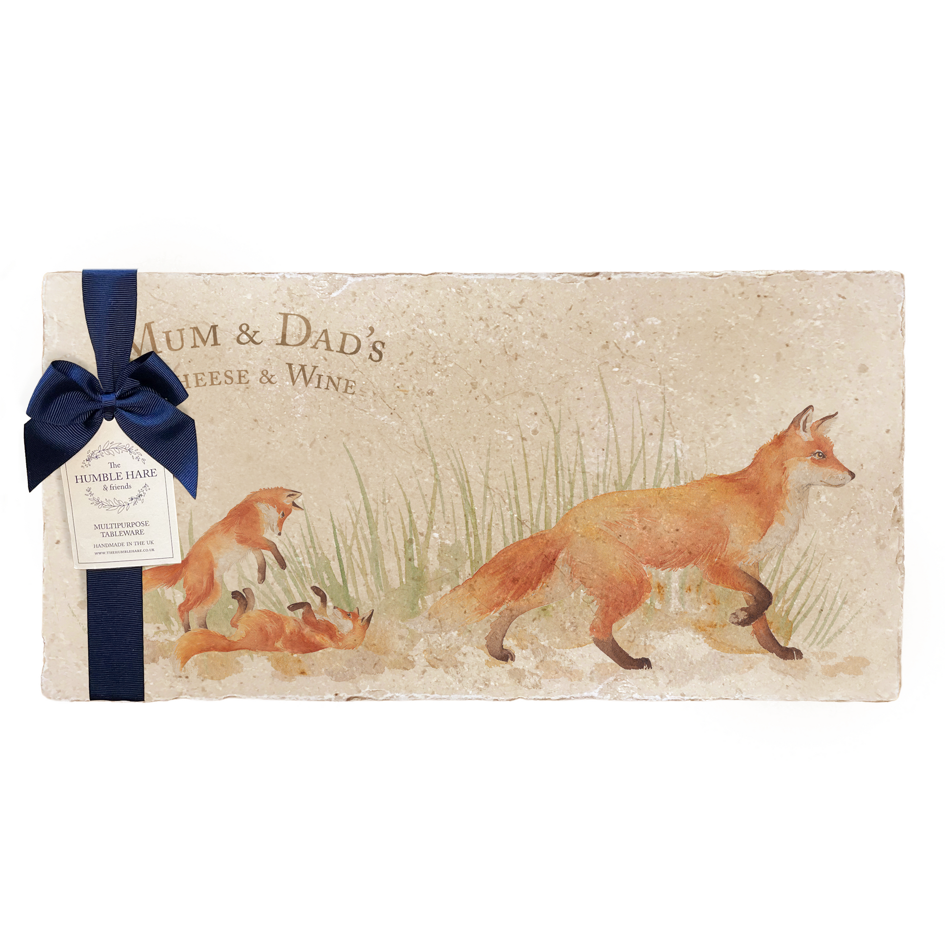 A personalised rectangular marble sharing platter featuring a fox design, packaged with a luxurious dark blue bow and branded gift tag.