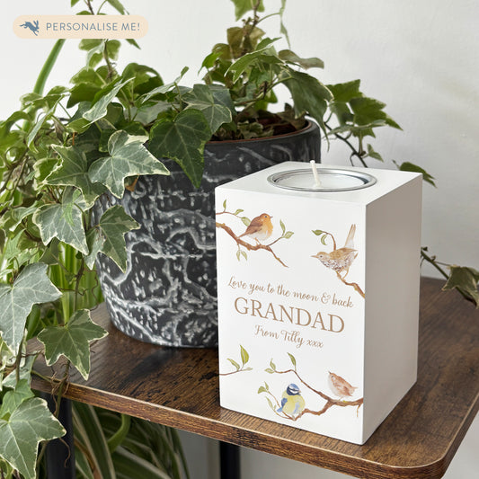 wooden cuboid luxury tealight holder with gorgeous personalised options . Each product is lovingly designed, handmade with our Countryside inspired watercolour designs. This design features birds on branches, bluetit, robin, wren and song thrush. unique designs for a truly one off special occasion for a loved one. 