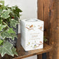 wooden cuboid luxury tealight holder with gorgeous personalised options . Each product is lovingly designed, handmade with our Countryside inspired watercolour designs. This design features birds on branches, bluetit, robin, wren and song thrush. unique designs for a truly one off special occasion for a loved one. 