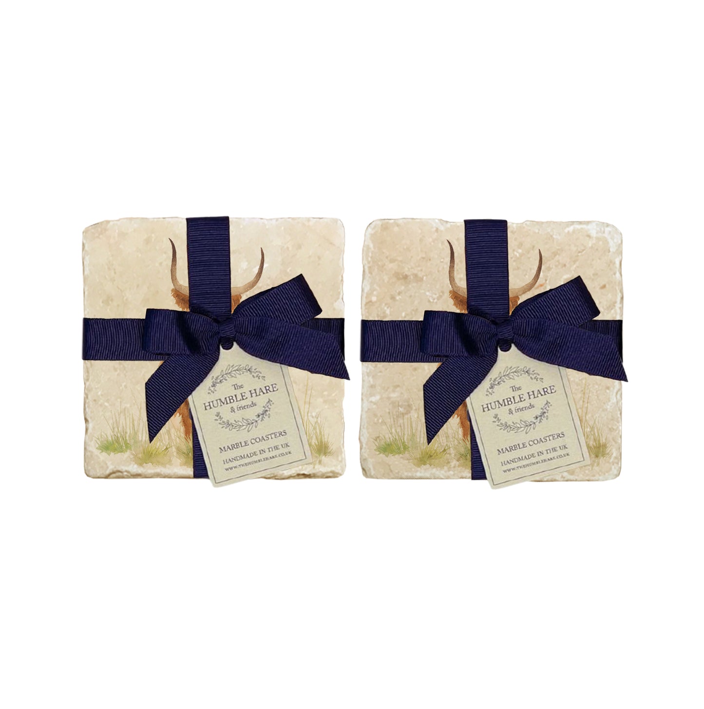 A set of 4 handmade marble coasters packaged in 2 pairs, with a luxurious blue bow and gift tag. The coasters feature a watercolour design of a highland cow.