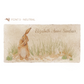 A personalised rectangular marble sharing platter featuring a hare washing his ear in a watercolour style. The example personalised neutral colour text reads ‘Elizabeth Anna Sinclair’ in a modern script font.