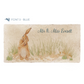 A personalised rectangular marble sharing platter featuring a hare washing his ear in a watercolour style. The example personalised dark blue text reads ‘Mr & Mrs Everett’ in a modern script font.