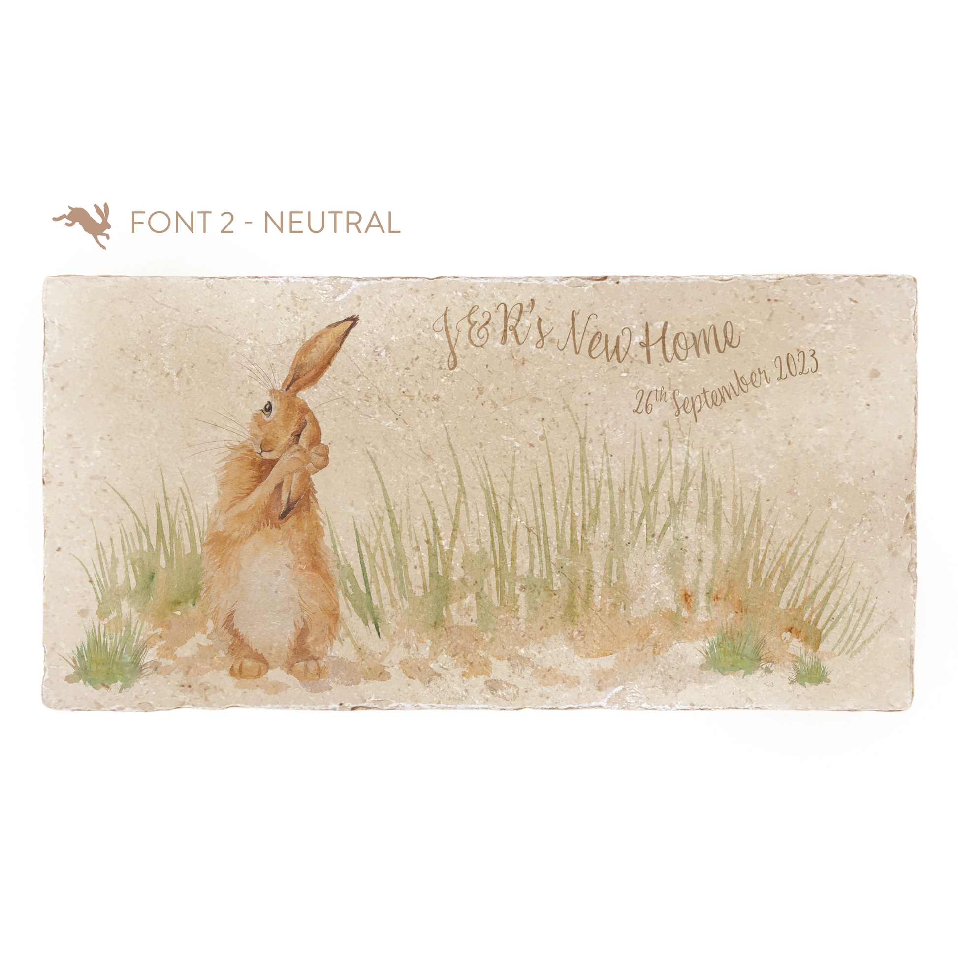 A personalised rectangular marble sharing platter featuring a hare washing his ear in a watercolour style. The example personalised neutral colour text reads ‘J&R’s New Home, 26th September 2023’ in an elegant script font.