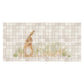 A rectangular wall art print or tile-style panel featuring a light brown rabbit standing among tall green grass on a beige tiled background, shown against a white surround.