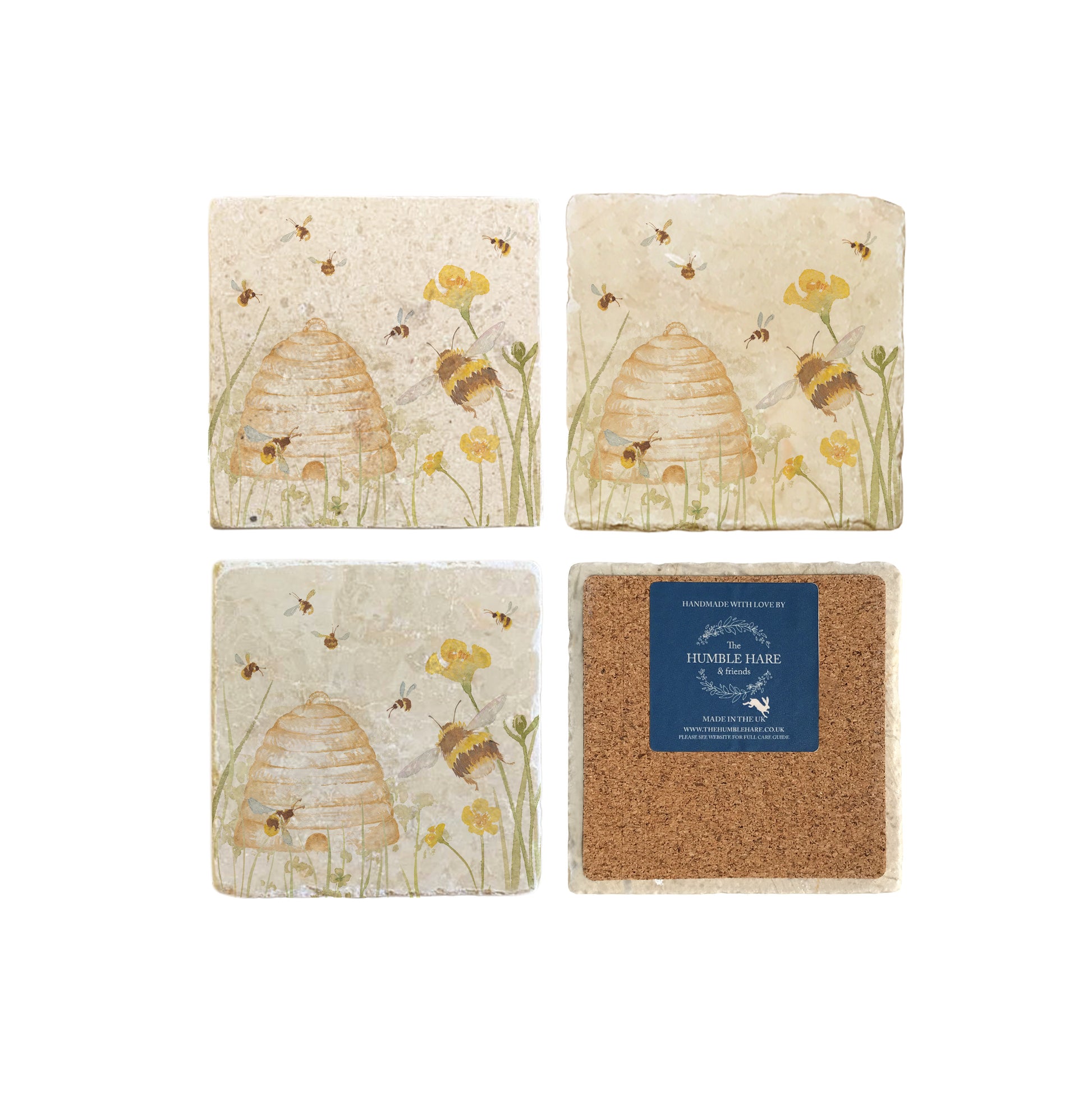  A set of 4 square marble coasters, featuring a watercolour design of bees and a beehive in a buttercup meadow. One coaster is flipped to show that the coasters are backed with cork.