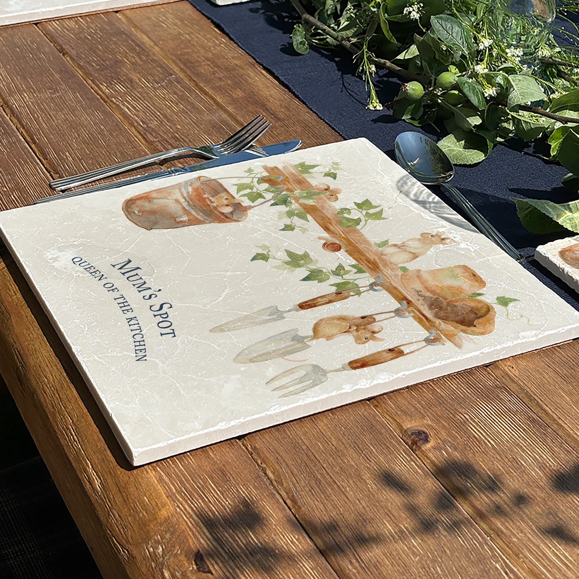 This Large Marble serving platter, this design  has some mischievous mice playing in the garden shed. 