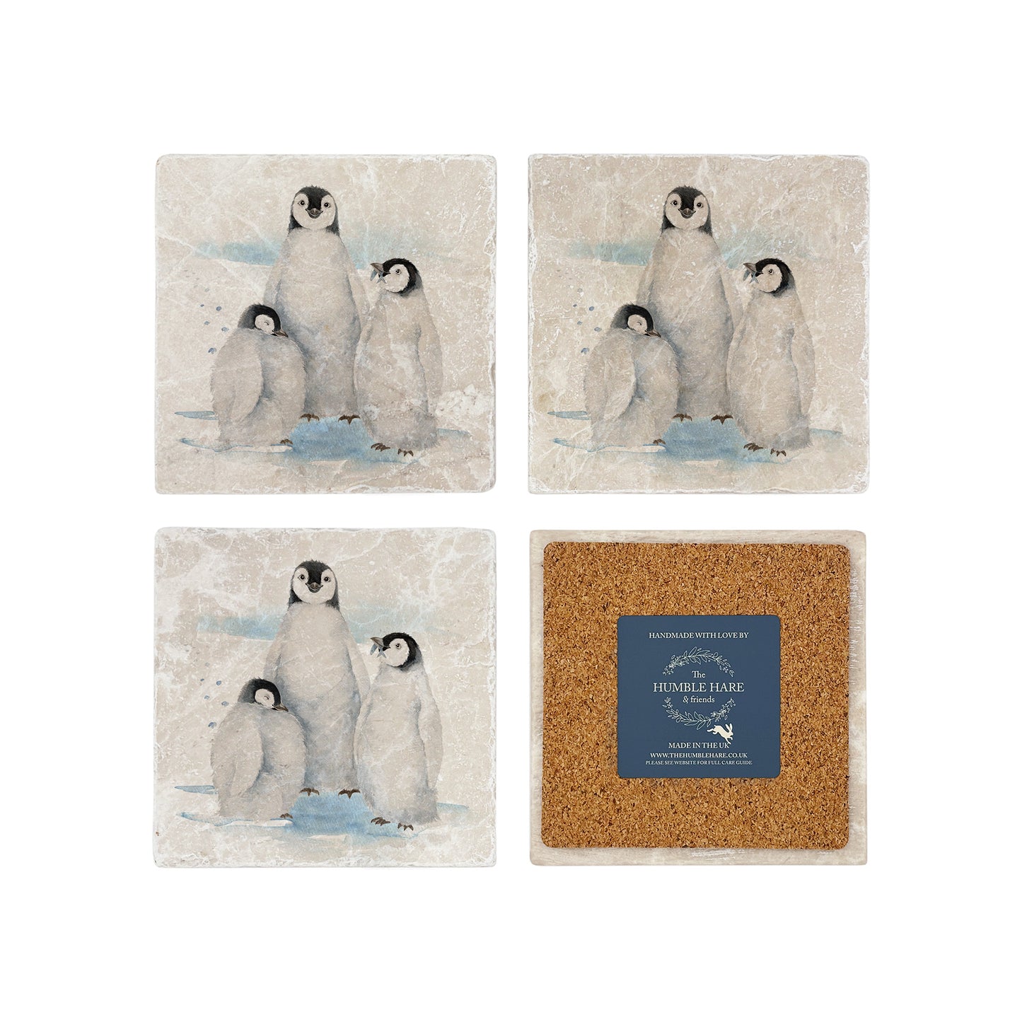 The Penguin Huddle Design features a set of 4 marble coasters with three penguins huddled together. One cheeky penguin has caught a fish to show his friends. 