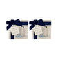 The Penguin Huddle Design features a set of 4 marble coasters with three penguins huddled together. One cheeky penguin has caught a fish to show his friends. The perfect finished with The Humble Hare signature blue ribbon and tag. 