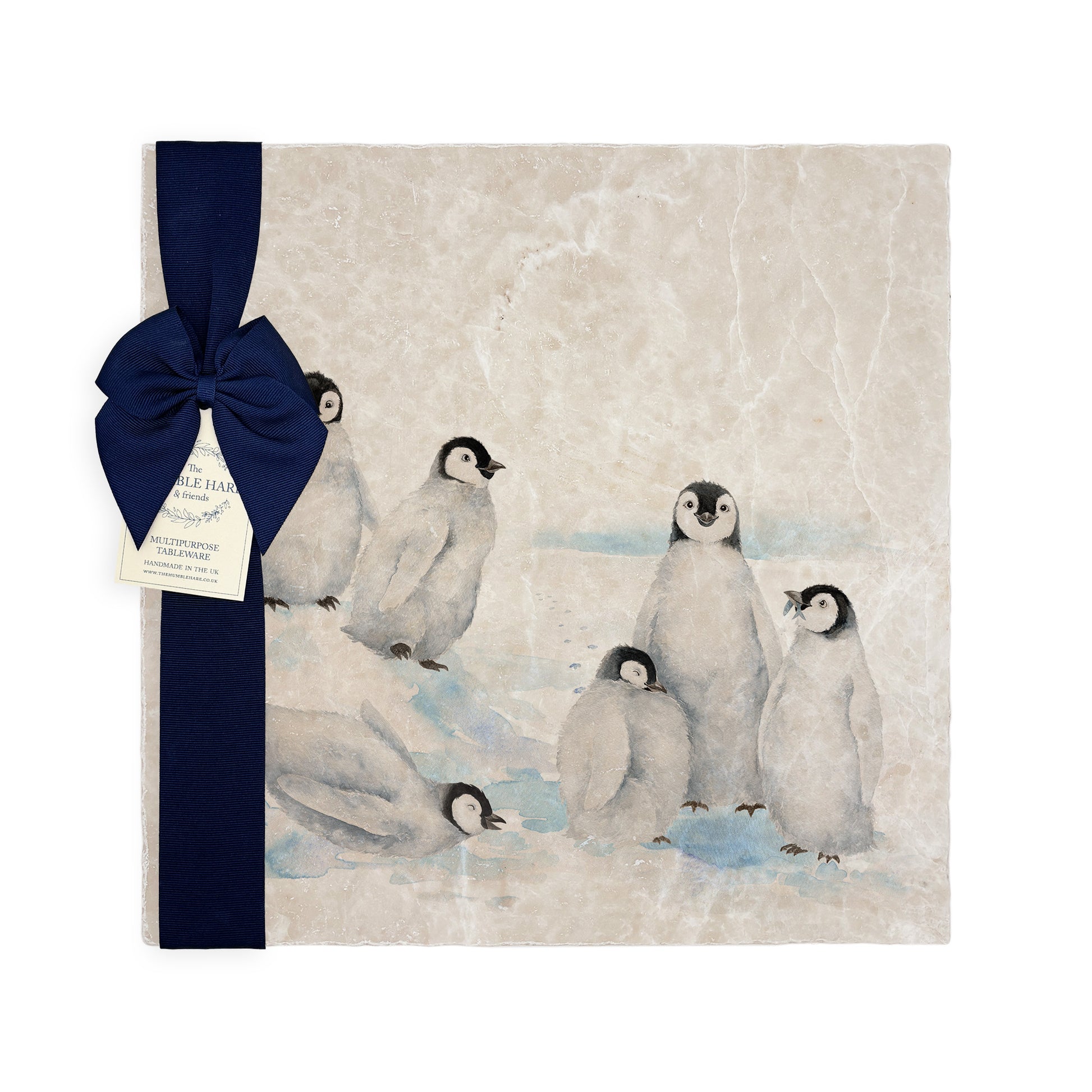Beautiful Penguin family huddled together on our best selling Large Platter they are in a snowy Antarctica the perfect gift finished with a blue ribbon.  