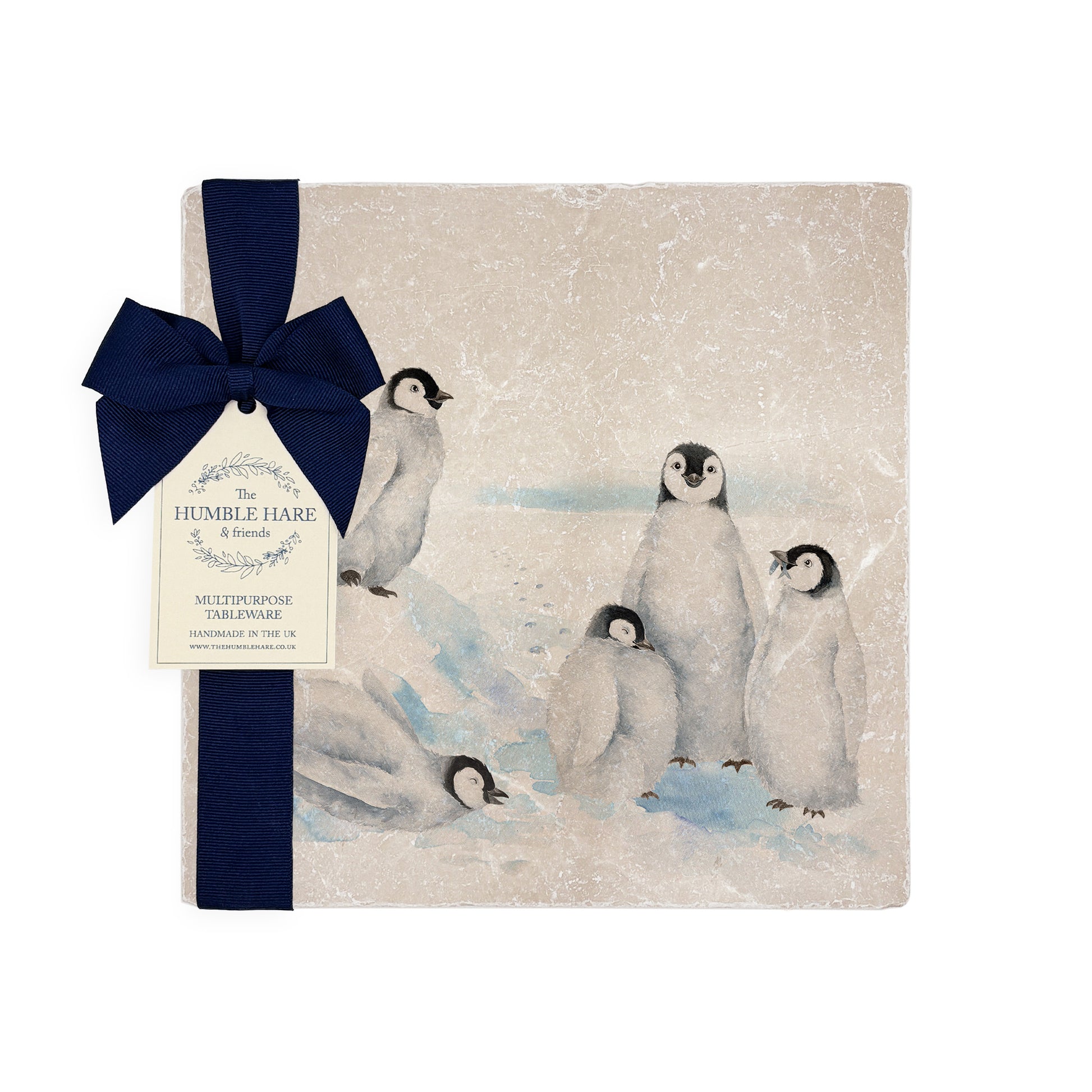 Beautiful Penguin family huddled together on our best selling medium platter they are in a snowy Antarctica the perfect gift finished with a blue ribbon.  