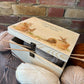 Medium wooden pine gift box, The perfect Personalised keepsake, memory box, storage box with lots of Bunnies ain pots holding bunches of flowers in their mouths in a classic  gentle watercolour style. Perfect for storing your knitting and and sewing equipment in. Best way to get organised