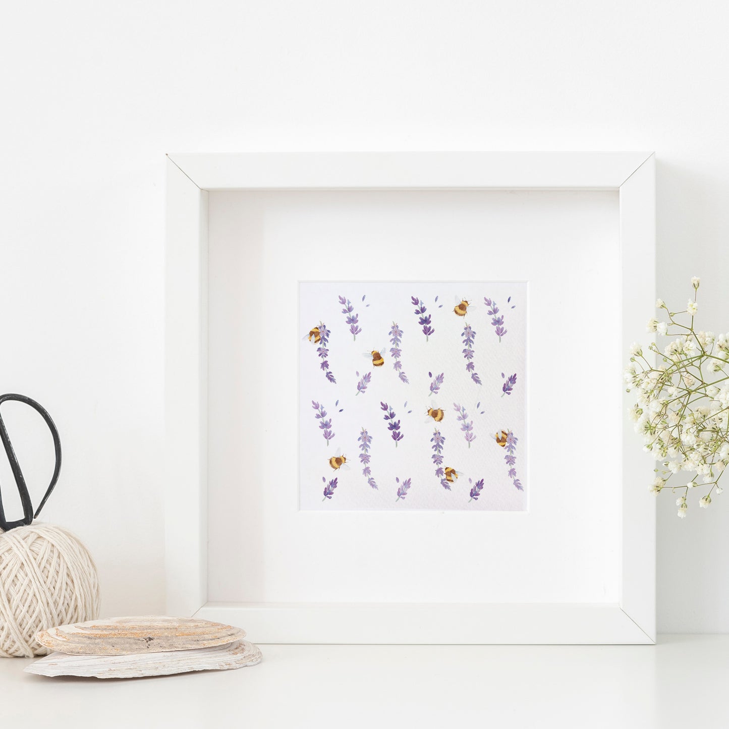 A framed greetings card with a watercolour busy bee and purple lavender flowers pattern.