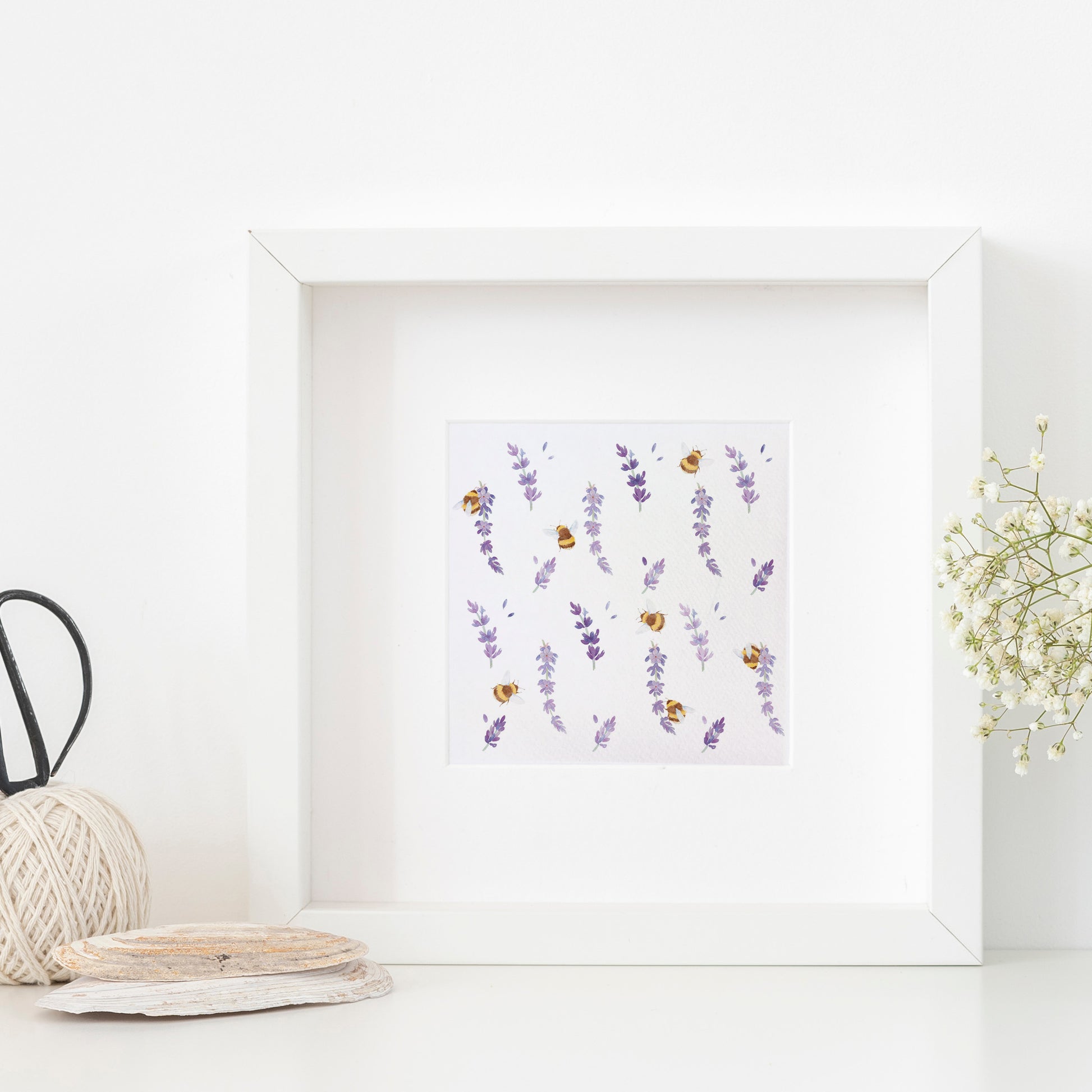 A framed greetings card with a watercolour busy bee and purple lavender flowers pattern.