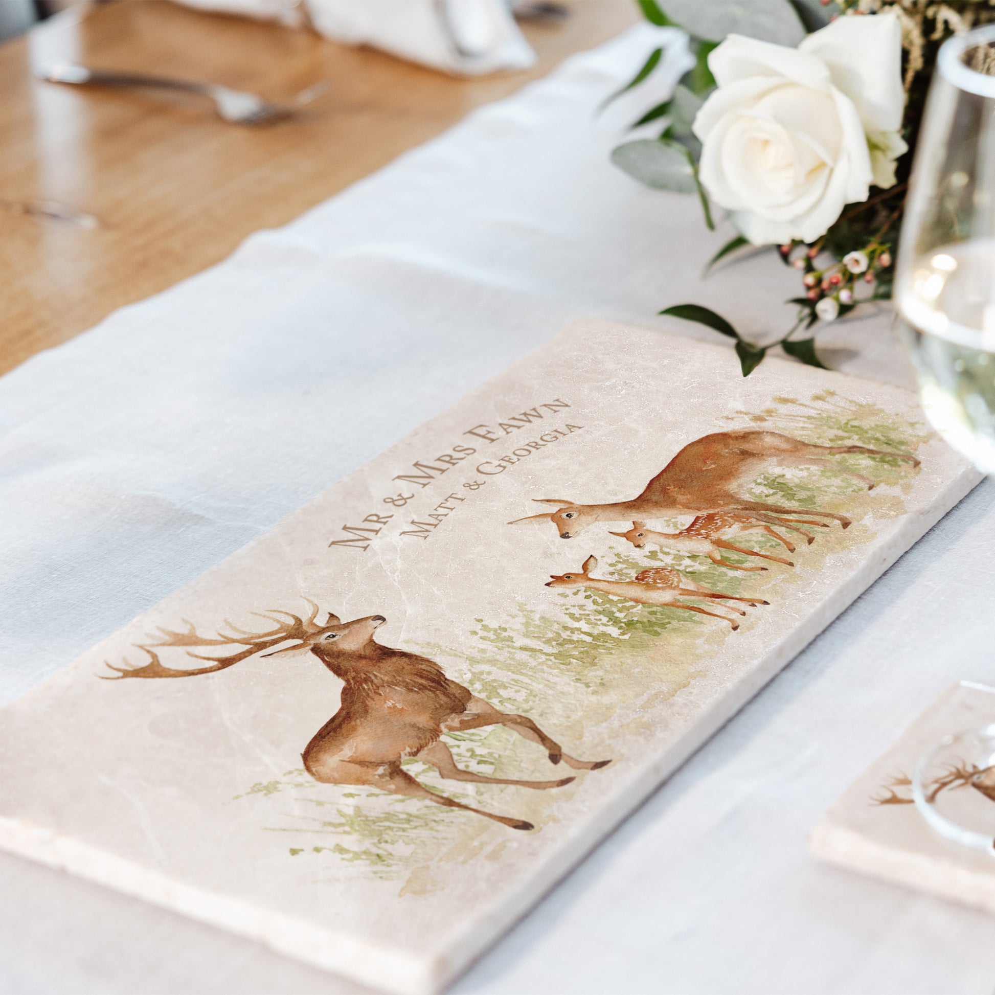 A personalised marble sharing platter with a family of red deer watercolour design. Create a personalised serving platter, trivet or cheeseboard as a luxury gift.