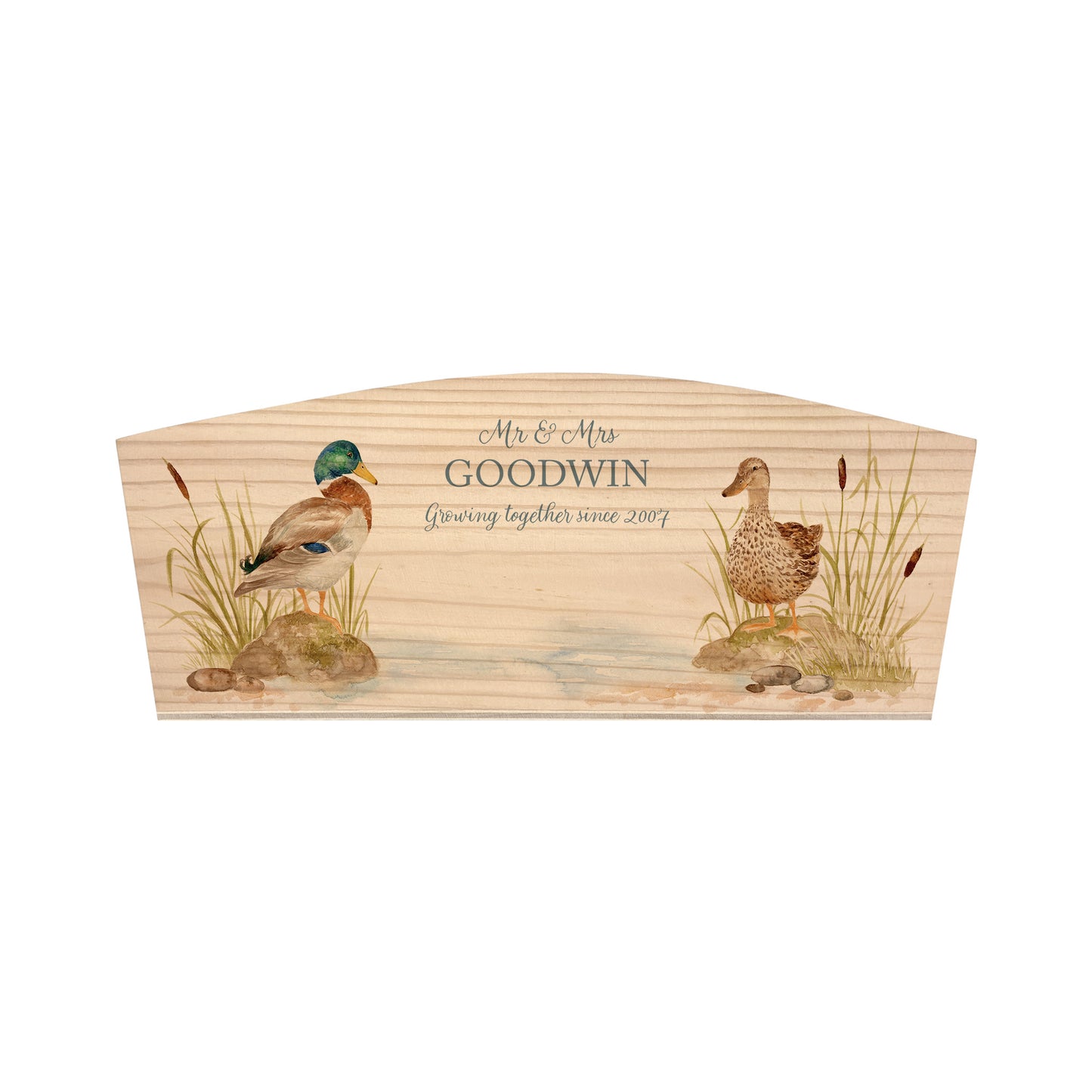 An arched wooden planter box with a watercolour design of two mallard ducks by the pond. The planter is an ideal gift for gardening enthusiasts, and can be personalised with a selection of phrases and custom names, dates and house number or name.