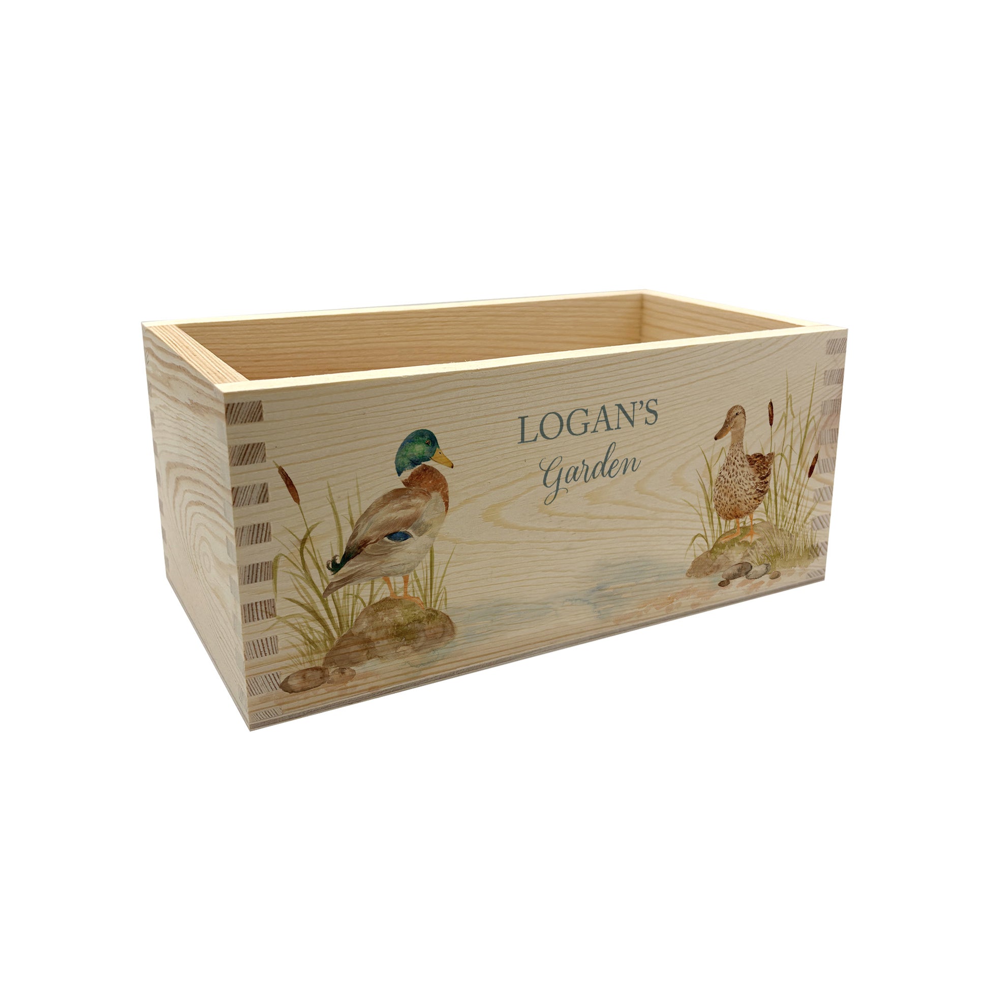 A rectangle wooden planter box with a watercolour design of two mallard ducks by the pond. The planter can be personalised with a name and a selection of custom phrases. Perfect gift for gardeners and special occasions. The planter can be used for bulbs and plants or as garden storage.