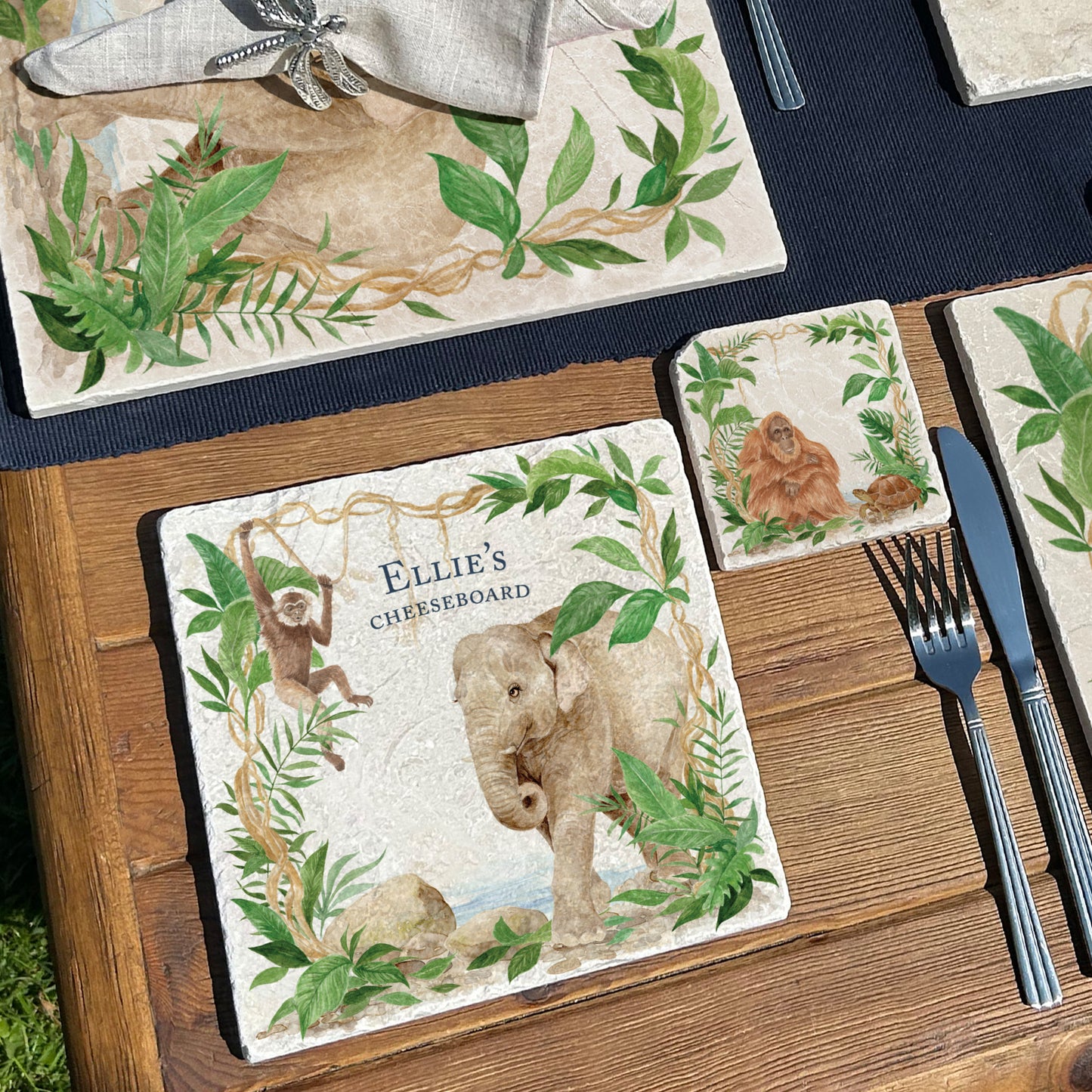 Welcoming our Rainforest Design, surrounded by the rainforest leaves and vines. Our Elephant and Gibbon swinging from the vines. Illustrated in our  original watercolour designs in our personalised Medium Serving Platter. 