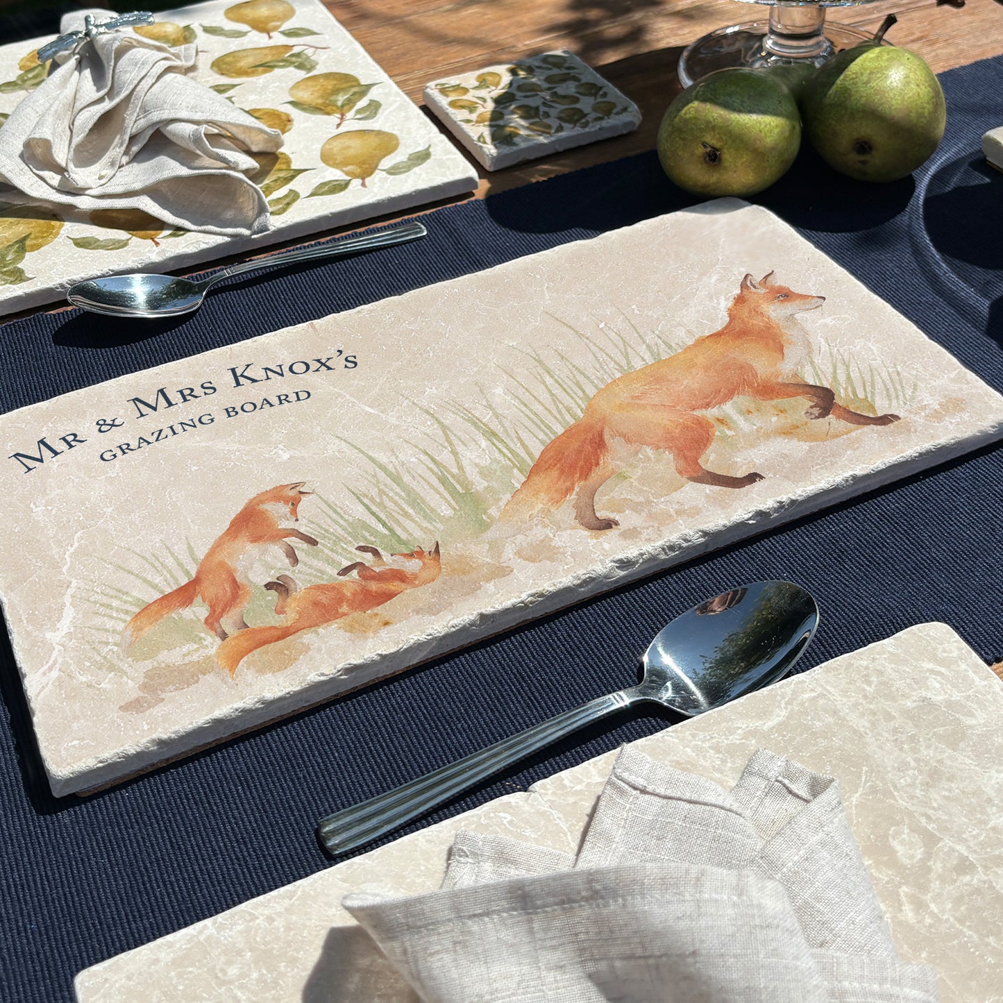 A personalised marble sharing platter with a fox and fox cub watercolour design. Create a personalised serving platter, trivet or cheeseboard as a luxury gift.