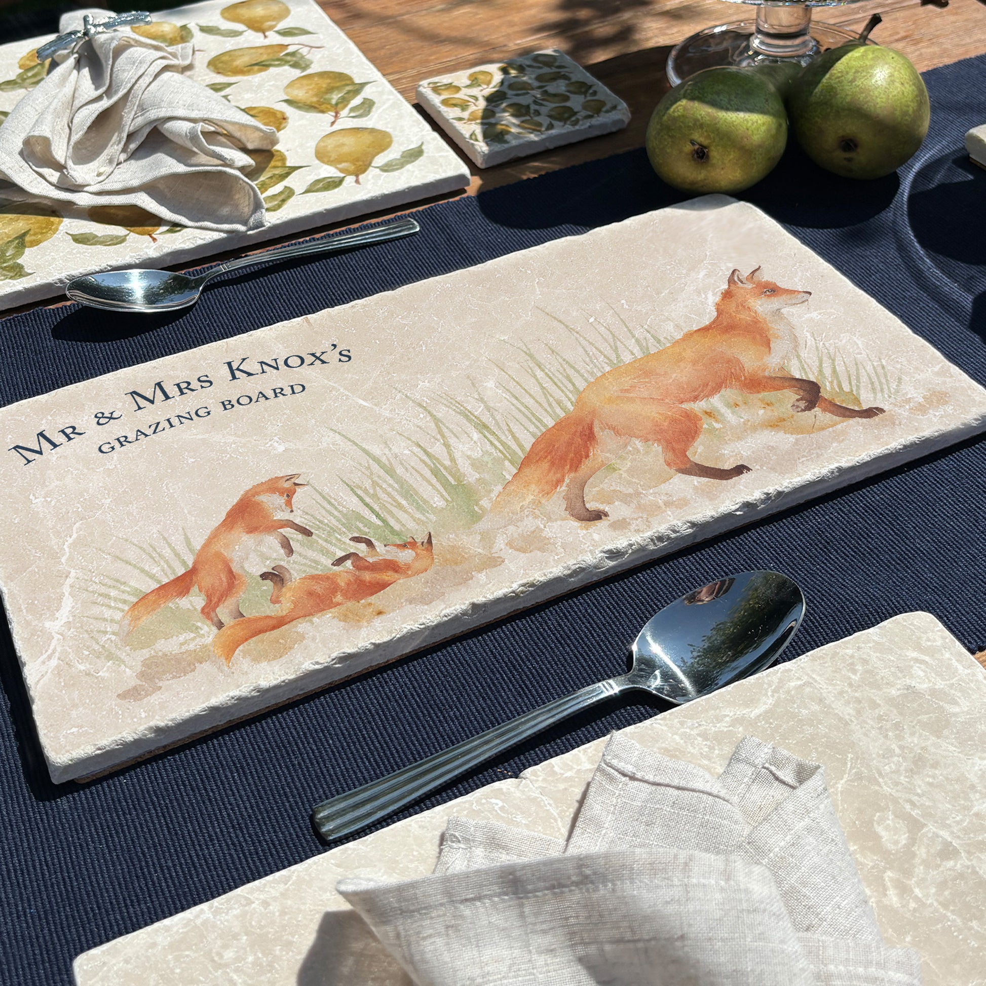 A personalised marble sharing platter with a fox and fox cub watercolour design. Create a personalised serving platter, trivet or cheeseboard as a luxury gift.