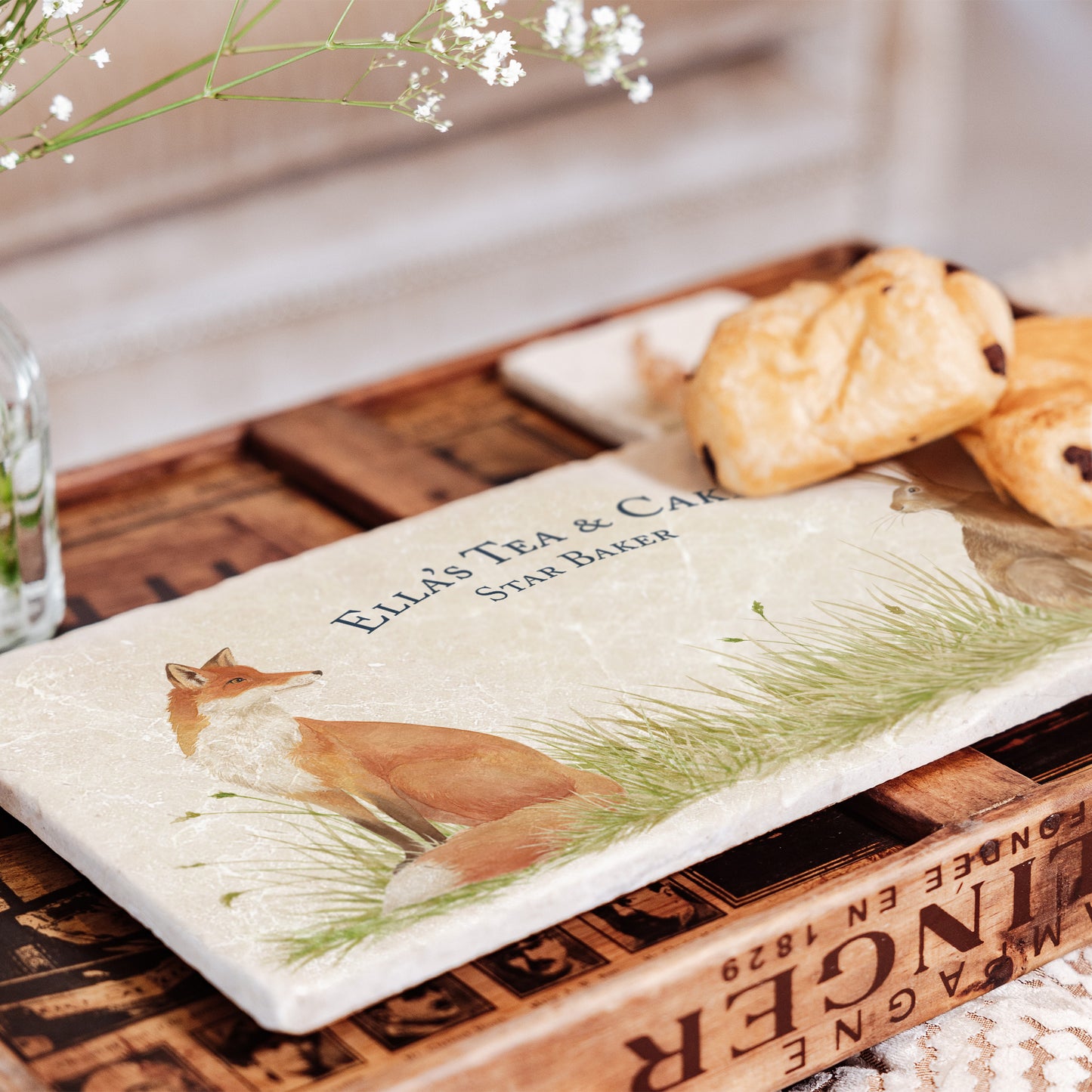A personalised marble sharing platter with a fox and hare in grass watercolour design. Create a personalised serving platter, trivet or cheeseboard as a luxury gift.