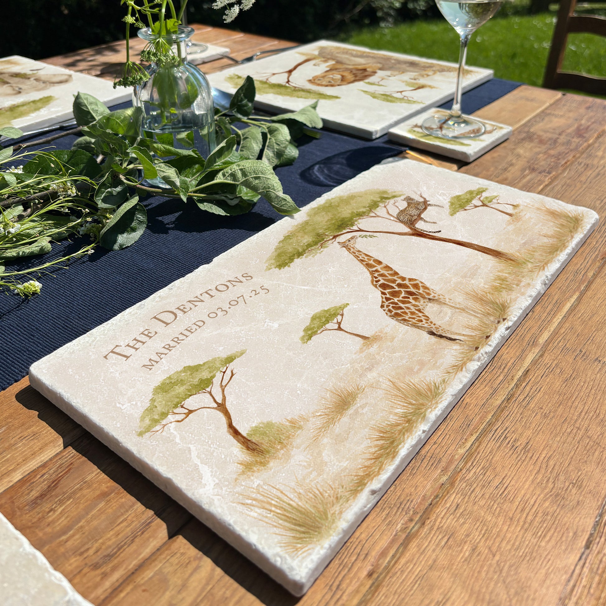 A personalised marble sharing platter with a giraffe and leopard in the savannah watercolour design. Create a personalised serving platter, trivet or cheeseboard as a luxury gift.