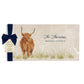 A personalised marble sharing platter featuring a highland cow in a watercolour style, packaged with a luxurious dark blue bow and branded gift tag.