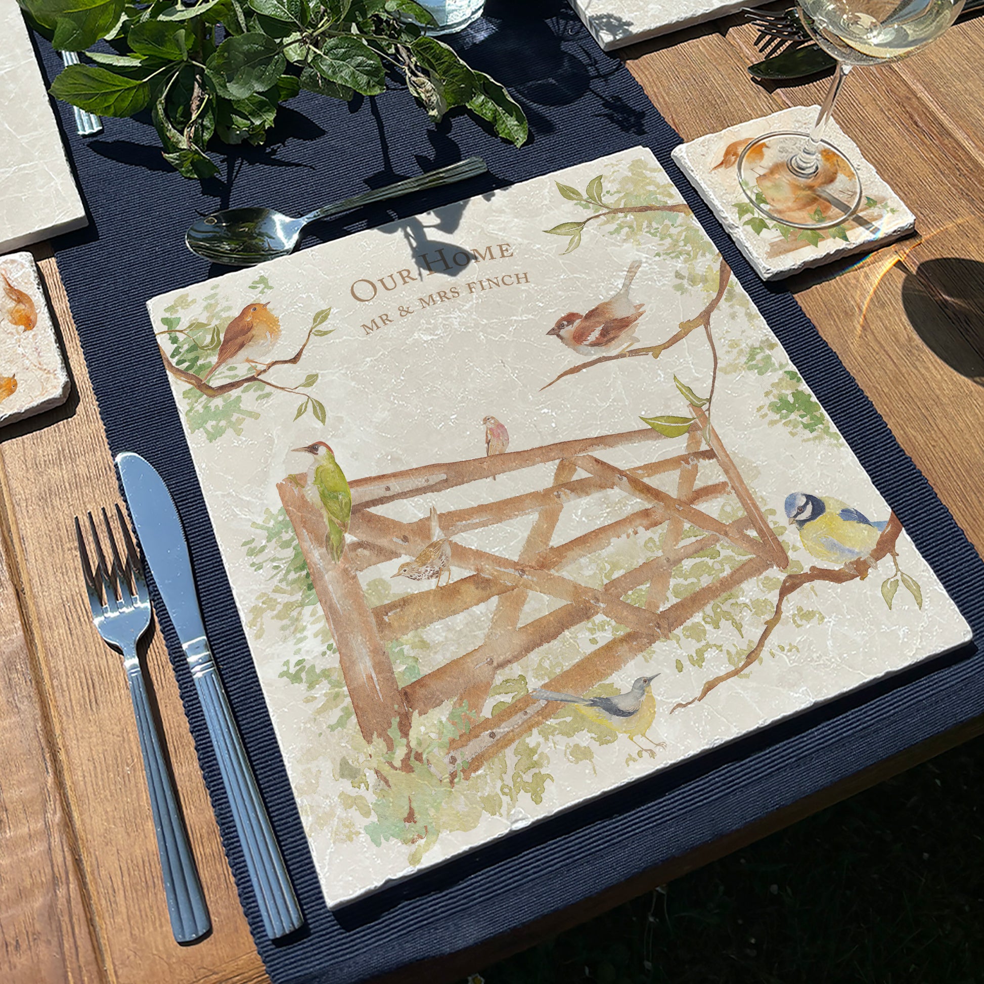 A personalised marble large platter with a garden birds in the hedgerow watercolour design. Create a personalised placemat, serving platter, trivet or cheeseboard as a luxury gift.
