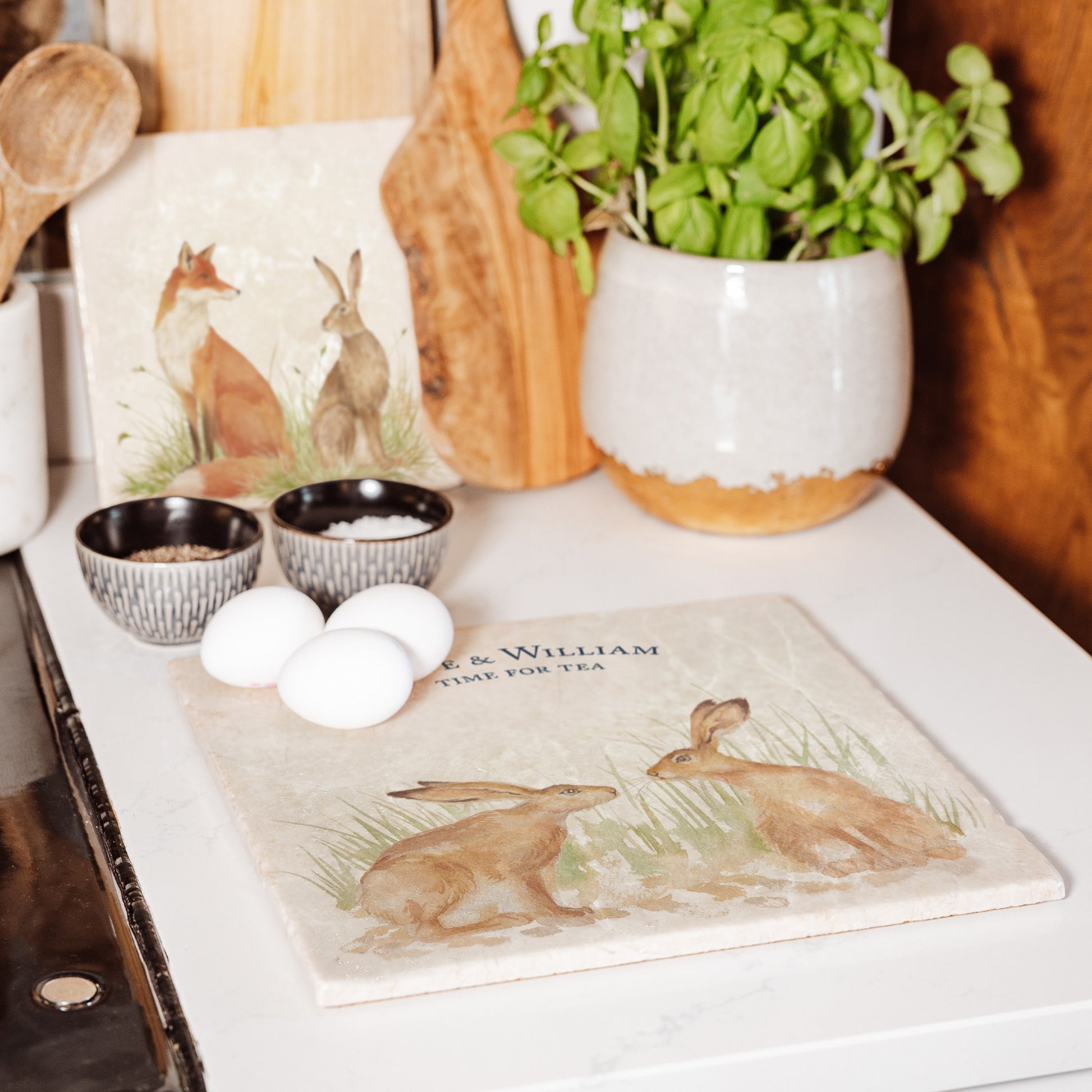 A personalised marble large platter with a kissing hares watercolour design. Create a personalised placemat, serving platter, trivet or cheeseboard as a luxury gift.