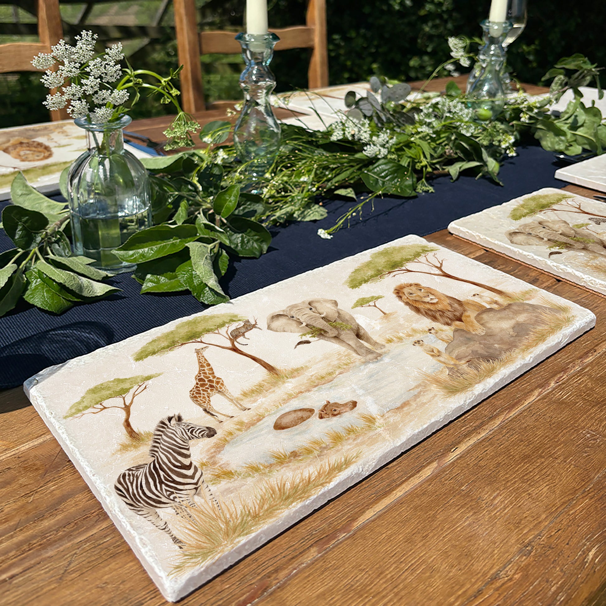 The Savannah Collectors set is perfect for the safari lover, featuring beautiful watercolour designs on our much loved marble platters and coasters. You can find and Elephant, Zebra, Meerkats and Lion, Hippo, Giraffe and Leopard 