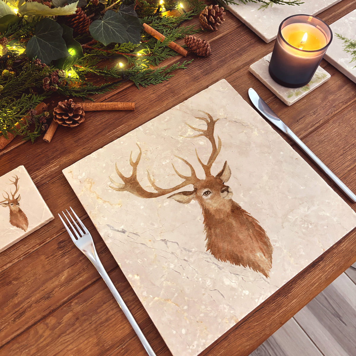 A large square marble platter featuring a watercolour portrait of a majestic stag.