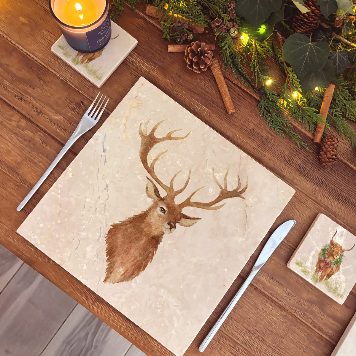 A large square marble platter featuring a watercolour portrait of a majestic stag.