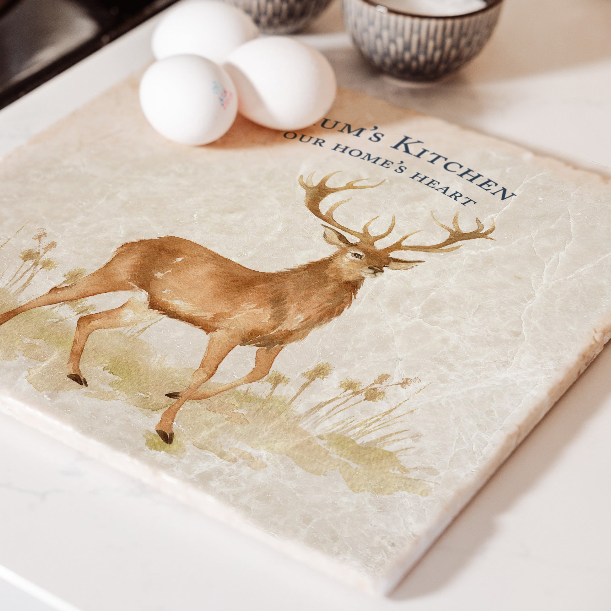 A personalised marble large platter with a highland stag watercolour design. Create a personalised placemat, serving platter, trivet or cheeseboard as a luxury gift.