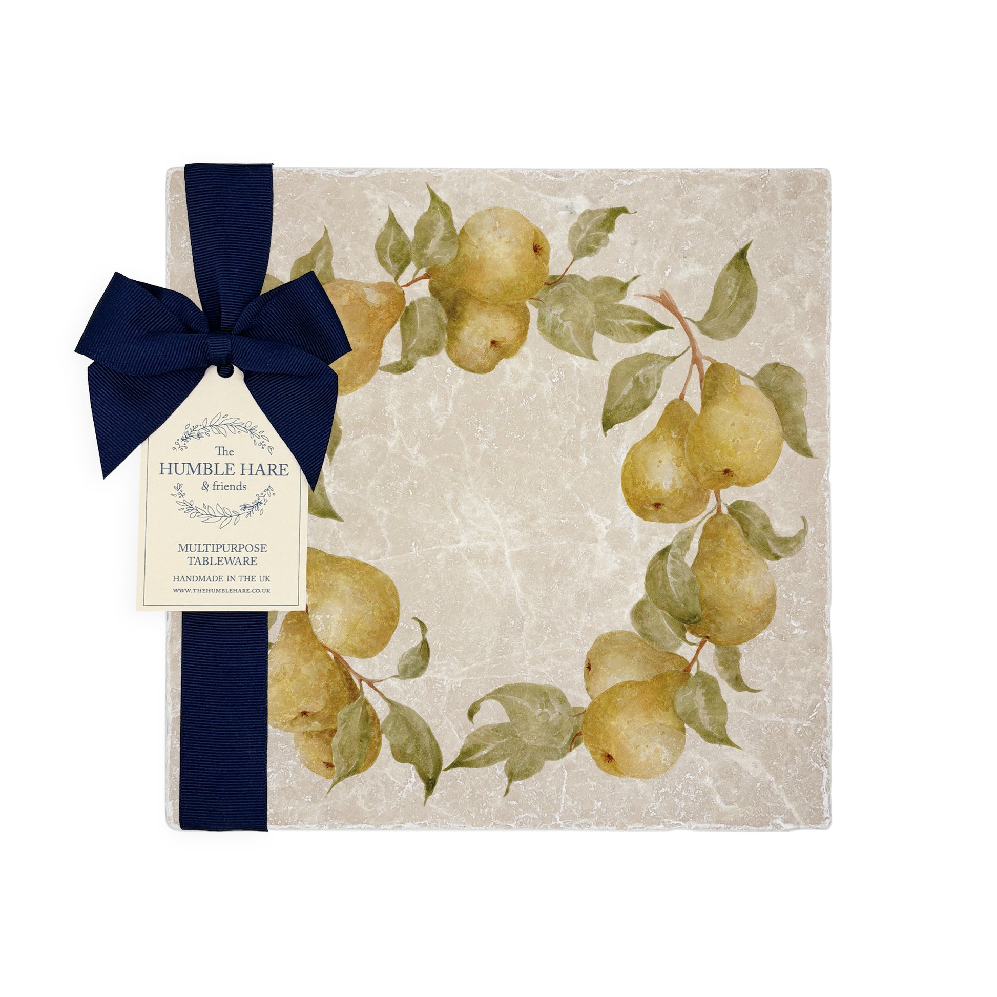A medium square marble platter featuring a watercolour pear wreath design. The platter is set on a dinner table next to a marble placemat and coaster.