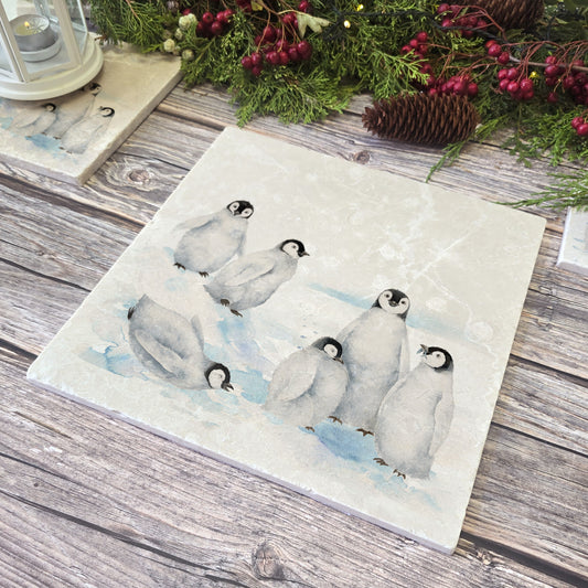 Beautiful Penguin family huddled together on our best selling Large Platter they are in a snowy Antarctica the perfect gift finished with a blue ribbon.  