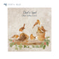 A large square personalised marble placemat with a Christmas robin and holly design. The placemat is personalised with 'Dad's Spot, Chief Turkey Carver' at the top in a blue brush script font.