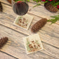 The Reindeers rest design features reindeer appearing from an opening in the wintery snowy forest. unique gift for someone special 
