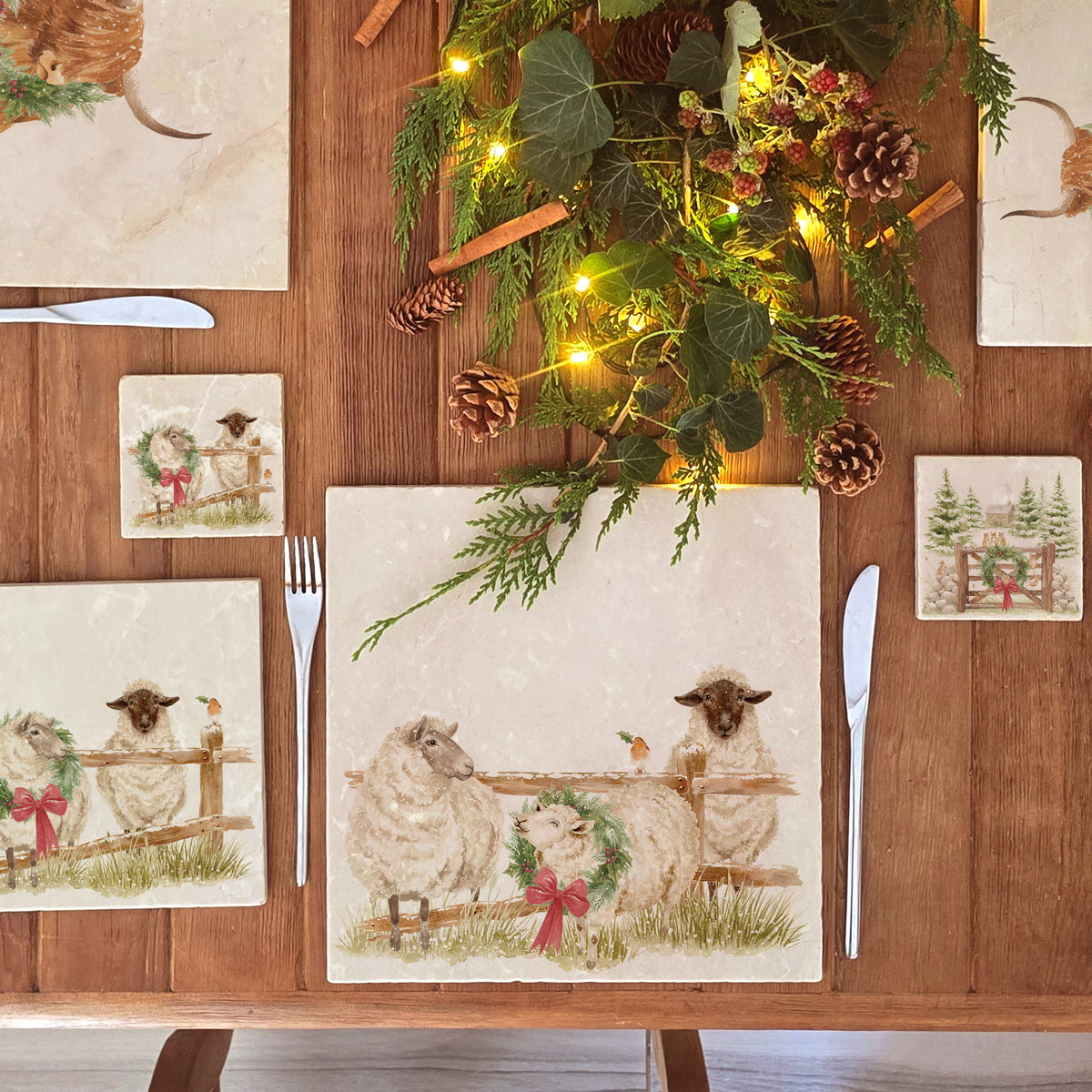 A large square marble platter featuring a watercolour illustration of a farmyard scene of sheep in the snow wearing a Christmas wreath.