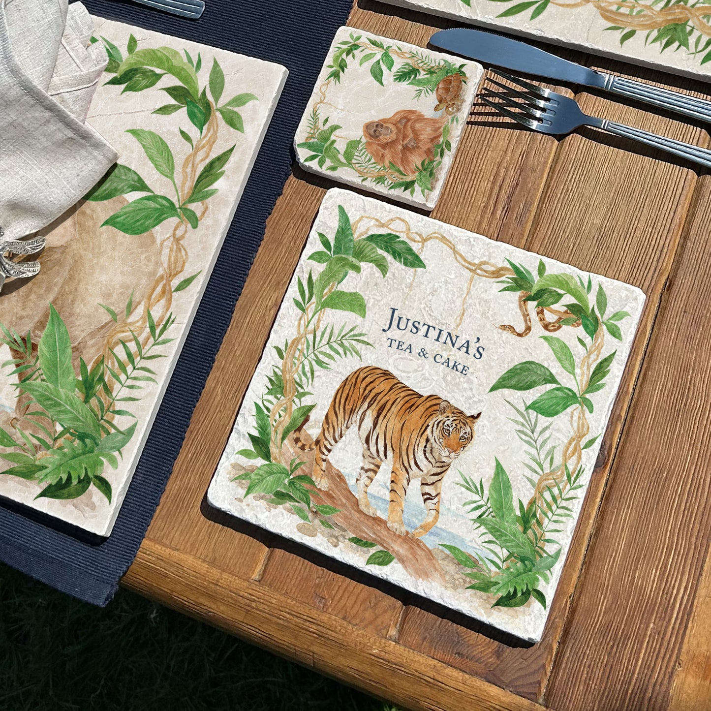 Welcoming our Rainforest Design, surrounded by the rainforest leaves and vines. Capture our Tiger and Python  quietly prowling through the Rainforest, Illustrated in our  original watercolour designs on our Medium Placemat which can be personalised. 