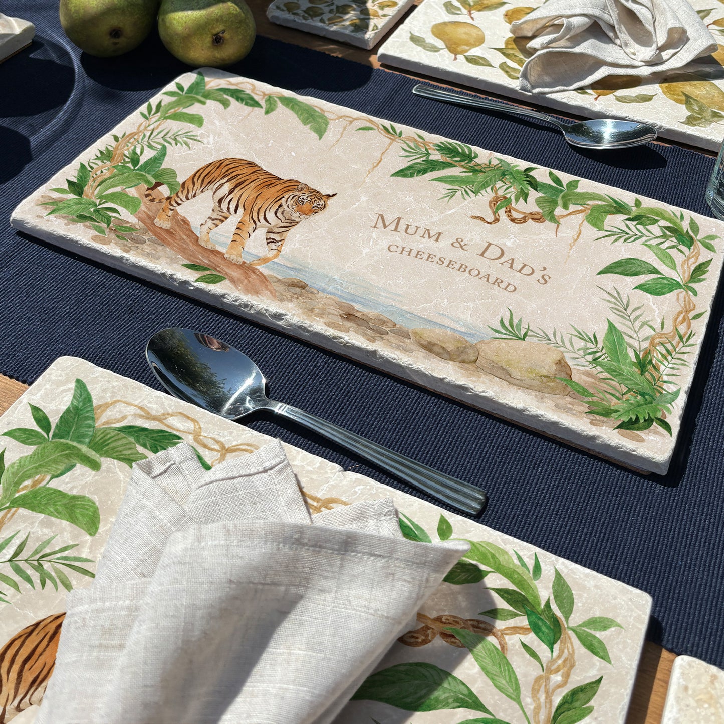 A personalised marble sharing platter with a tiger and python rainforest watercolour design. Create a personalised serving platter, trivet or cheeseboard as a luxury gift.
