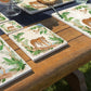 Welcoming our Rainforest Design, surrounded by the rainforest leaves and vines. Capture our Tiger and Python  quietly prowling through the Rainforest, Illustrated in our  original watercolour designs on our Medium Placemat. 